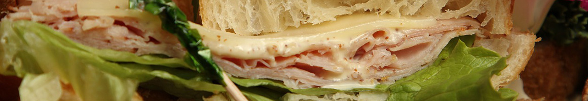 Eating Italian Pizza Sandwich at Italian Delight Pizza restaurant in Mechanicsburg, PA.